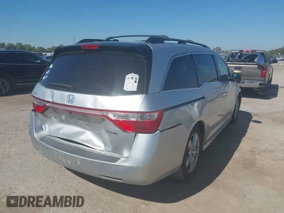 2012 Honda Odyssey Touring с VIN 5FNRL5H95CB122101, выставлен на аукционе IAAI как лот 43489117 с пробегом 154 148 миль миль и . История ставок и продаж доступна на DreamBid. Изображение 4.