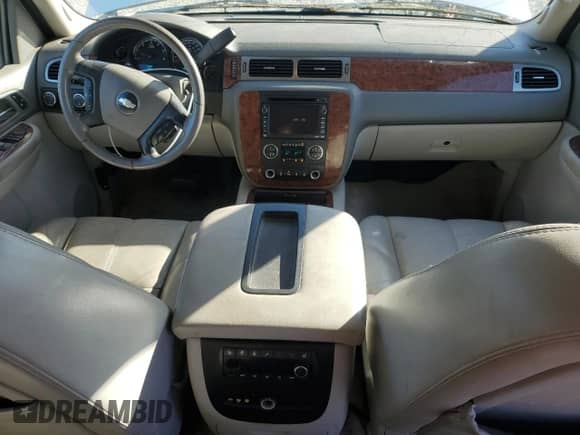 2007 Chevrolet Tahoe LS with VIN 1GNFK13027R320164, listed as a Copart auction lot 76479034 with 214,465 mi miles and Salvage title. Bid and sale history available at DreamBid. Image 8.