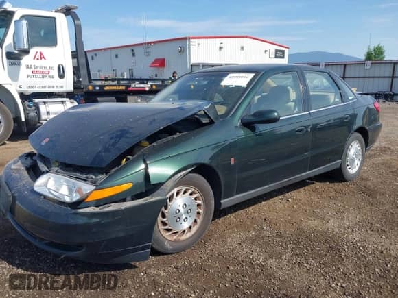 2001 Saturn LS with VIN 1G8JU52F81Y830650, listed as a IAAI auction lot 42588016 with 125,712 mi miles and . Bid and sale history available at DreamBid. Image 2.