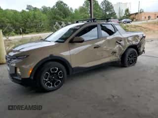 2023 Hyundai Santa Cruz SEL with VIN 5NTJC4AE1PH049848, listed as a Copart auction lot 71648264 with 34,336 mi miles and Salvage title. Bid and sale history available at DreamBid. Image 1.