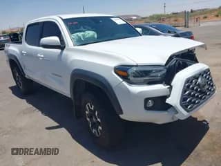2021 Toyota Tacoma SR with VIN 3TMCZ5AN0MM395231, listed as a IAAI auction lot 42420637 with 84,036 mi miles and . Bid and sale history available at DreamBid. Image 1.