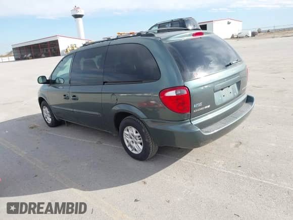 2003 Dodge Caravan Sport with VIN 2D4GP44333R307911, listed as a IAAI auction lot 43491223 with 86,853 mi miles and . Bid and sale history available at DreamBid. Image 3.