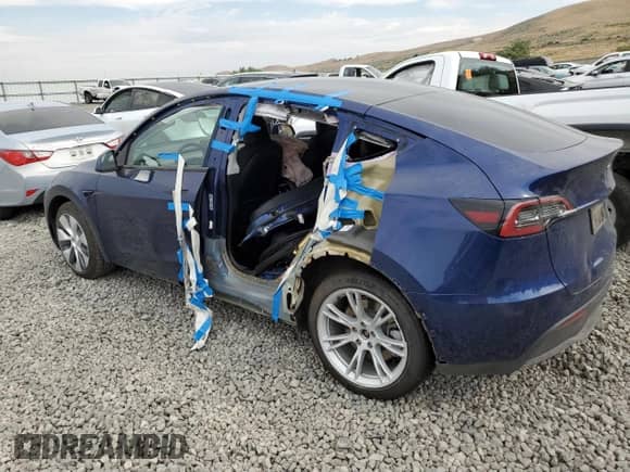 2023 Tesla Model Y Long Range with VIN 7SAYGDEE7PF849910, listed as a Copart auction lot 65620724 with Not provided miles and Salvage title. Bid and sale history available at DreamBid. Image 2.
