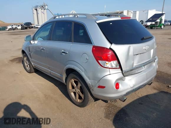2012 Chevrolet Captiva Sport LTZ z VIN 3GNFL4E51CS583986, wystawiony jako IAAI lot #42661592 z przebiegiem 134 645 mil mil oraz . Historia ofert i sprzedaży dostępna na DreamBid. Obrazek 3.