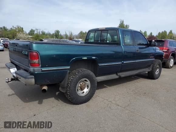 1995 Dodge 2500 with VIN 3B7KF23C2SM183989, listed as a Copart auction lot 49992354 with 351,195 mi miles and Salvage title. Bid and sale history available at DreamBid. Image 3.