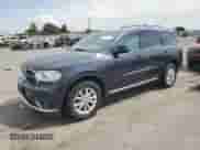 2014 Dodge Durango SXT with VIN 1C4RDJAG5EC539717, listed as a Copart auction lot 70519855 with 116,632 mi miles and Salvage title. Bid and sale history available at DreamBid. Image 1.
