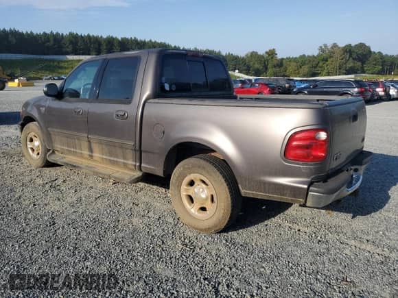 2002 Ford F-150 XLT с VIN 1FTRW07L32KC44092, выставлен на аукционе Copart как лот 80965375 с пробегом 274 782 миль миль и Чистый • Clean title. История ставок и продаж доступна на DreamBid. Изображение 2.