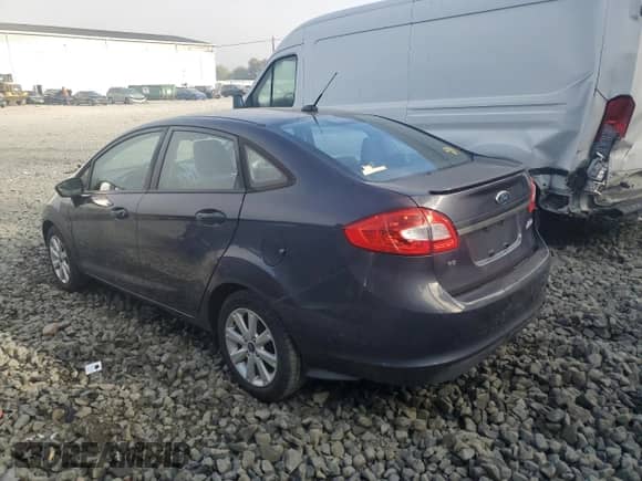 2012 Ford Fiesta SE с VIN 3FADP4BJ0CM155729, выставлен на аукционе Copart как лот 85286035 с пробегом 90 092 миль миль и Списание • Salvage title. История ставок и продаж доступна на DreamBid. Изображение 2.