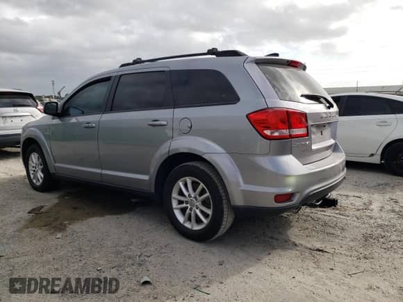 2017 Dodge Journey SXT with VIN 3C4PDCBG1HT515599, listed as a Copart auction lot 81980675 with 169,857 mi miles and Clean title. Bid and sale history available at DreamBid. Image 2.