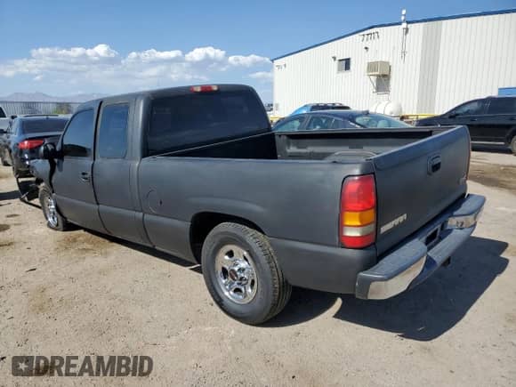 2003 GMC Sierra 1500 SLE with VIN 2GTEC19V531282291, listed as a Copart auction lot 55162465 with 210,028 mi miles and Salvage title. Bid and sale history available at DreamBid. Image 2.