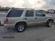 2003 Chevrolet Blazer LS с VIN 1GNCS13X53K148585, выставлен на аукционе Copart как лот 82339174 с пробегом 262 249 миль миль и Списание • Salvage title. История ставок и продаж доступна на DreamBid. Изображение 3.