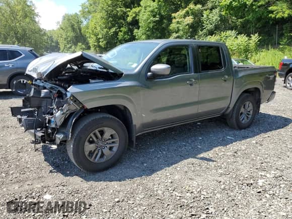 2025 Nissan Frontier Pro-4X with VIN 1N6ED1EK2SN632379, listed as a Copart auction lot 65193755 with 1,959 mi miles and Salvage title. Bid and sale history available at DreamBid. Image 1.