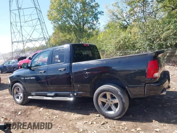 2012 Ram 1500 Express z VIN 1C6RD7FT3CS144597, wystawiony jako IAAI lot #43324074 z przebiegiem 103 170 mil mil oraz . Historia ofert i sprzedaży dostępna na DreamBid. Obrazek 14.