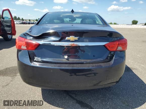 2014 Chevrolet Impala LT with VIN 2G1115SL4E9298757, listed as a Copart auction lot 70176775 with 165,892 mi miles and Salvage title. Bid and sale history available at DreamBid. Image 6.