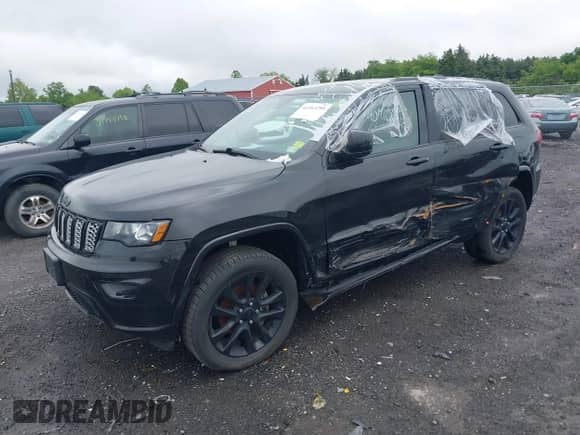 2019 Jeep Grand Cherokee Altitude with VIN 1C4RJFAG9KC579011, listed as a IAAI auction lot 42263250 with 85,595 mi miles and . Bid and sale history available at DreamBid. Image 17.
