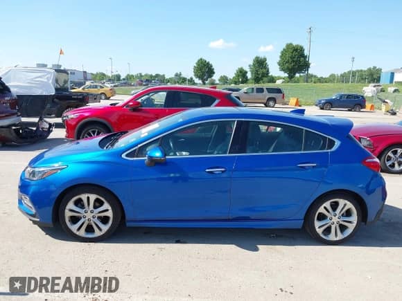 2017 Chevrolet Cruze Premier z VIN 3G1BF6SM3HS560456, wystawiony jako IAAI lot #42542260 z przebiegiem 156 855 mil mil oraz . Historia ofert i sprzedaży dostępna na DreamBid. Obrazek 14.