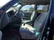 2004 Toyota Tundra SR5 z VIN 5TBET341X4S443964, wystawiony jako Copart lot #69156295 z przebiegiem 186 353 mil mil oraz Szkoda całkowita • Salvage title. Historia ofert i sprzedaży dostępna na DreamBid. Obrazek 7.