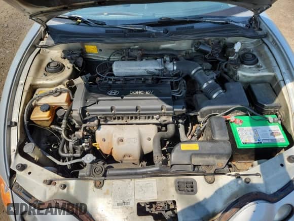 2001 Hyundai Tiburon с VIN KMHJG25FX1U237982, выставлен на аукционе Copart как лот 65774595 с пробегом 125 241 миль миль и Списание • Salvage title. История ставок и продаж доступна на DreamBid. Изображение 11.