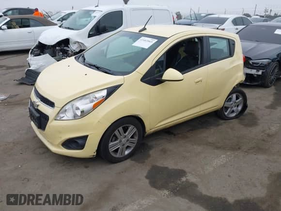 2014 Chevrolet Spark LS with VIN KL8CB6S95EC440803, listed as a IAAI auction lot 43402065 with 116,349 mi miles and . Bid and sale history available at DreamBid. Image 2.