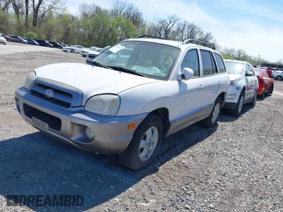 2005 Hyundai Santa Fe GLS with VIN KM8SC13D95U888747, listed as a IAAI auction lot 38833174 with 154,111 mi miles and . Bid and sale history available at DreamBid. Image 2.
