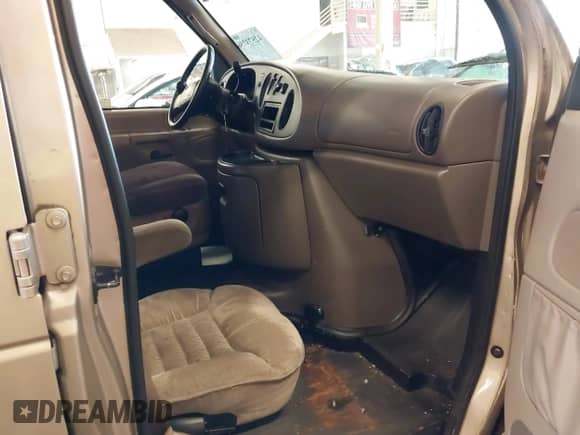 1999 Ford Econoline Cargo with VIN 1FDRE14W5XHA87026, listed as a IAAI auction lot 42573756 with 93,360 mi miles and . Bid and sale history available at DreamBid. Image 5.