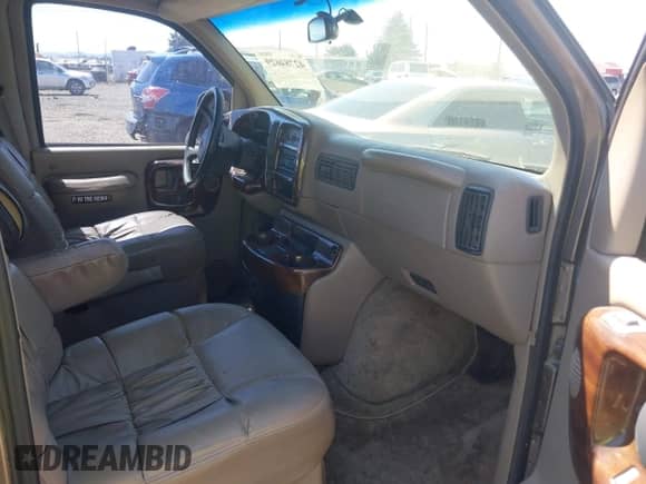 1999 Chevrolet Express z VIN 1GBFG15R7X1048543, wystawiony jako IAAI lot #42784629 z przebiegiem 188 722 mil mil oraz . Historia ofert i sprzedaży dostępna na DreamBid. Obrazek 5.