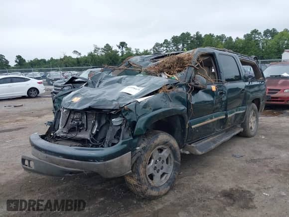 2004 Chevrolet Suburban LS with VIN 1GNFK16T24J204902, listed as a IAAI auction lot 42958818 with Not provided miles and . Bid and sale history available at DreamBid. Image 6.