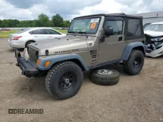2004 Jeep Wrangler Rubicon with VIN 1J4FA69S24P713388, listed as a Copart auction lot 61196515 with 155,092 mi miles and Clean title. Bid and sale history available at DreamBid. Image 1.