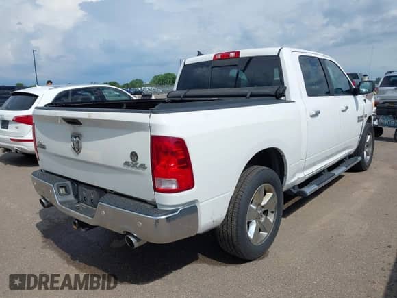 2015 Ram 1500 Outdoorsman with VIN 1C6RR7LT9FS789894, listed as a IAAI auction lot 42517634 with 101,687 mi miles and . Bid and sale history available at DreamBid. Image 4.