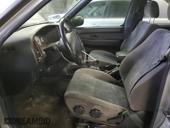 2001 Nissan Pathfinder LE с VIN JN8DR09Y11W589336, выставлен на аукционе Copart как лот 87762545 с пробегом 291 518 миль миль и Списание • Salvage title. История ставок и продаж доступна на DreamBid. Изображение 7.