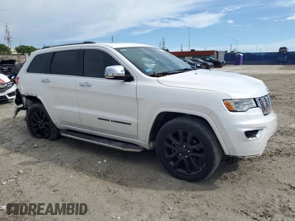 2017 Jeep Grand Cherokee Overland with VIN 1C4RJECG4HC740042, listed as a Copart auction lot 83797275 with 67,534 mi miles and Salvage title. Bid and sale history available at DreamBid. Image 4.
