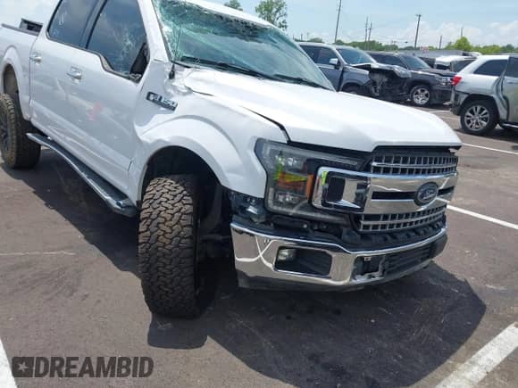 2019 Ford F-150 XL with VIN 1FTEW1CB3KKC43767, listed as a IAAI auction lot 42468954 with 96,504 mi miles and . Bid and sale history available at DreamBid. Image 1.
