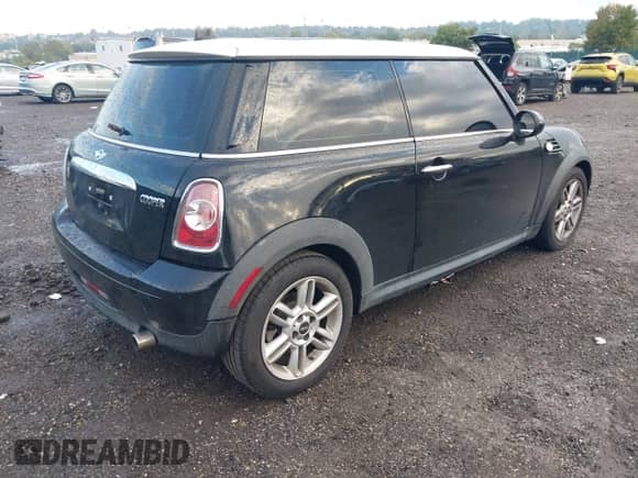 2013 MINI Hardtop with VIN WMWSU3C50DT374065, listed as a IAAI auction lot 43250917 with 107,544 mi miles and . Bid and sale history available at DreamBid. Image 4.