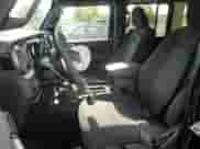 2023 Jeep Wrangler Sahara Altitude with VIN 1C4HJXEG1PW600466, listed as a Copart auction lot 80017505 with 21,912 mi miles and Salvage title. Bid and sale history available at DreamBid. Image 7.