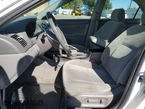 2002 Toyota Camry LE с VIN 4T1BE32K82U108769, выставлен на аукционе Copart как лот 87386685 с пробегом 212 044 миль миль и Списание • Salvage title. История ставок и продаж доступна на DreamBid. Изображение 7.