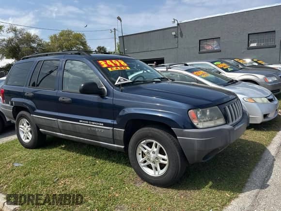 2004 Jeep Grand Cherokee Laredo z VIN 1J4GX48N24C436753, wystawiony jako Copart lot #48782585 z przebiegiem 114 035 mil mil oraz Czysty tytuł • Clean title. Historia ofert i sprzedaży dostępna na DreamBid. Obrazek 1.
