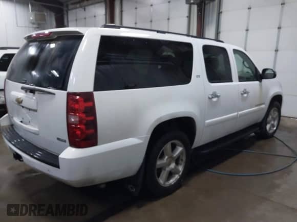 2008 Chevrolet Suburban 3LT z VIN 1GNFK16388J208099, wystawiony jako IAAI lot #41710552 z przebiegiem 228 929 mil mil oraz . Historia ofert i sprzedaży dostępna na DreamBid. Obrazek 4.