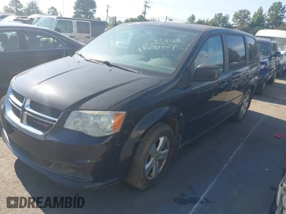 2013 Dodge Grand Caravan American Value with VIN 2C4RDGBG1DR601010, listed as a IAAI auction lot 43293889 with 156,529 mi miles and . Bid and sale history available at DreamBid. Image 2.