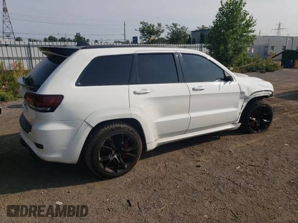 2014 Jeep Grand Cherokee SRT-8 с VIN 1C4RJFDJ0EC310729, выставлен на аукционе Copart как лот 66663005 с пробегом 182 640 миль миль и Чистый • Clean title. История ставок и продаж доступна на DreamBid. Изображение 3.