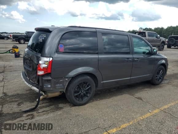 2019 Dodge Grand Caravan GT with VIN 2C4RDGEG2KR736389, listed as a Copart auction lot 68547745 with 122,379 mi miles and Salvage title. Bid and sale history available at DreamBid. Image 3.
