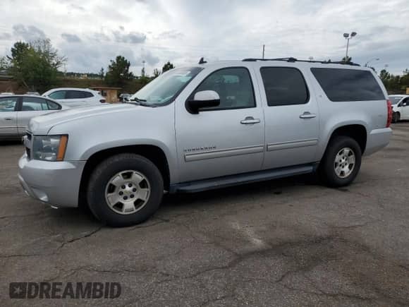 2012 Chevrolet Suburban LT z VIN 1GNSCJE00CR146873, wystawiony jako Copart lot #84454565 z przebiegiem 239 561 mil mil oraz Czysty tytuł • Clean title. Historia ofert i sprzedaży dostępna na DreamBid. Obrazek 1.