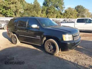2011 Chevrolet Tahoe LTZ with VIN 1GNSCCE06BR200316, listed as a IAAI auction lot 43452250 with 265,562 mi miles and . Bid and sale history available at DreamBid. Image 1.