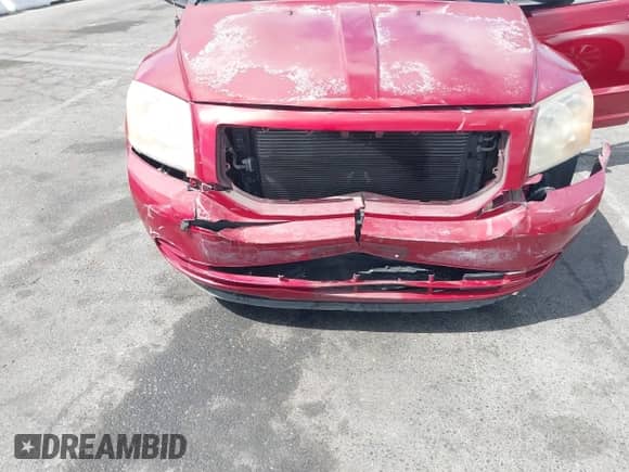 2009 Dodge Caliber SXT with VIN 1B3HB48A09D200014, listed as a IAAI auction lot 43213766 with 73,272 mi miles and . Bid and sale history available at DreamBid. Image 6.