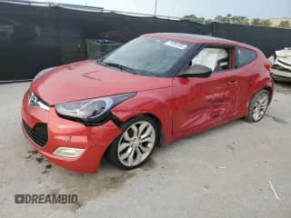 2012 Hyundai Veloster w/Red Int с VIN KMHTC6AD1CU070298, выставлен на аукционе Copart как лот 71091355 с пробегом 144 305 миль миль и Чистый • Clean title. История ставок и продаж доступна на DreamBid. Изображение 1.