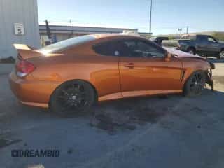2006 Hyundai Tiburon GT с VIN KMHHN65FX6U207318, выставлен на аукционе Copart как лот 68147734 с пробегом 180 284 миль миль и Списание • Salvage title. История ставок и продаж доступна на DreamBid. Изображение 3.