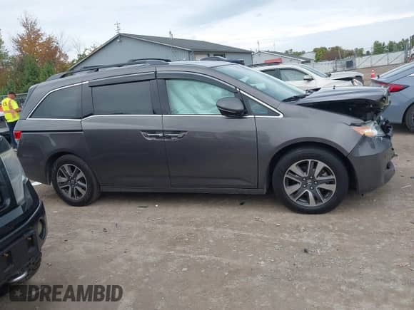 2016 Honda Odyssey Touring Elite с VIN 5FNRL5H94GB058168, выставлен на аукционе IAAI как лот 43302272 с пробегом 233 057 миль миль и . История ставок и продаж доступна на DreamBid. Изображение 13.