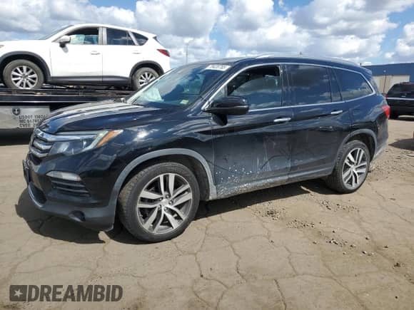 2018 Honda Pilot Touring with VIN 5FNYF5H91JB021704, listed as a Copart auction lot 70420785 with 127,929 mi miles and Clean title. Bid and sale history available at DreamBid. Image 1.