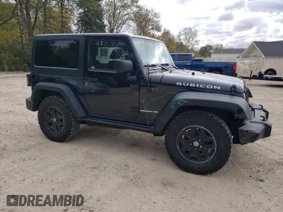 2016 Jeep Wrangler Rubicon with VIN 1C4HJWCG8GL151365, listed as a Copart auction lot 86309335 with 52,989 mi miles and Salvage title. Bid and sale history available at DreamBid. Image 4.
