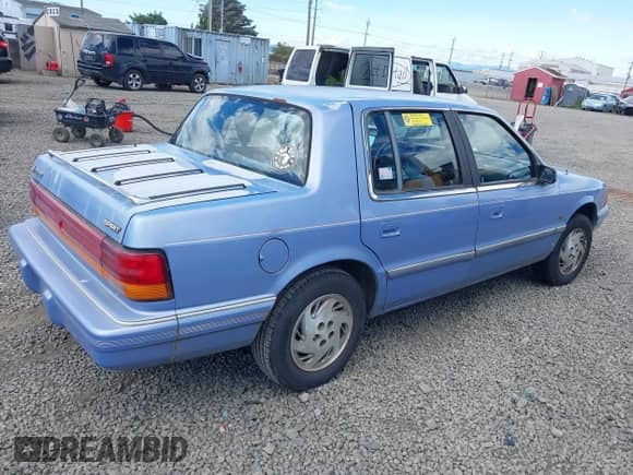 1994 Dodge Spirit with VIN 3B3AA463XRT207314, listed as a IAAI auction lot 41442625 with 140,757 mi miles and . Bid and sale history available at DreamBid. Image 4.
