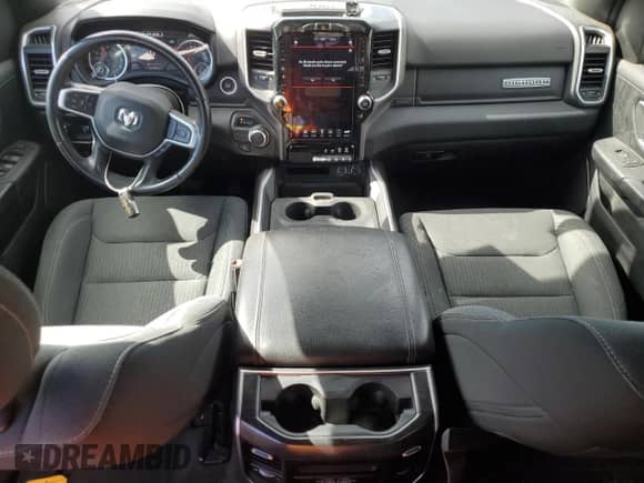 2021 Ram 1500 Big Horn with VIN 1C6RREFG1MN610200, listed as a Copart auction lot 84767334 with 61,999 mi miles and Clean title. Bid and sale history available at DreamBid. Image 8.